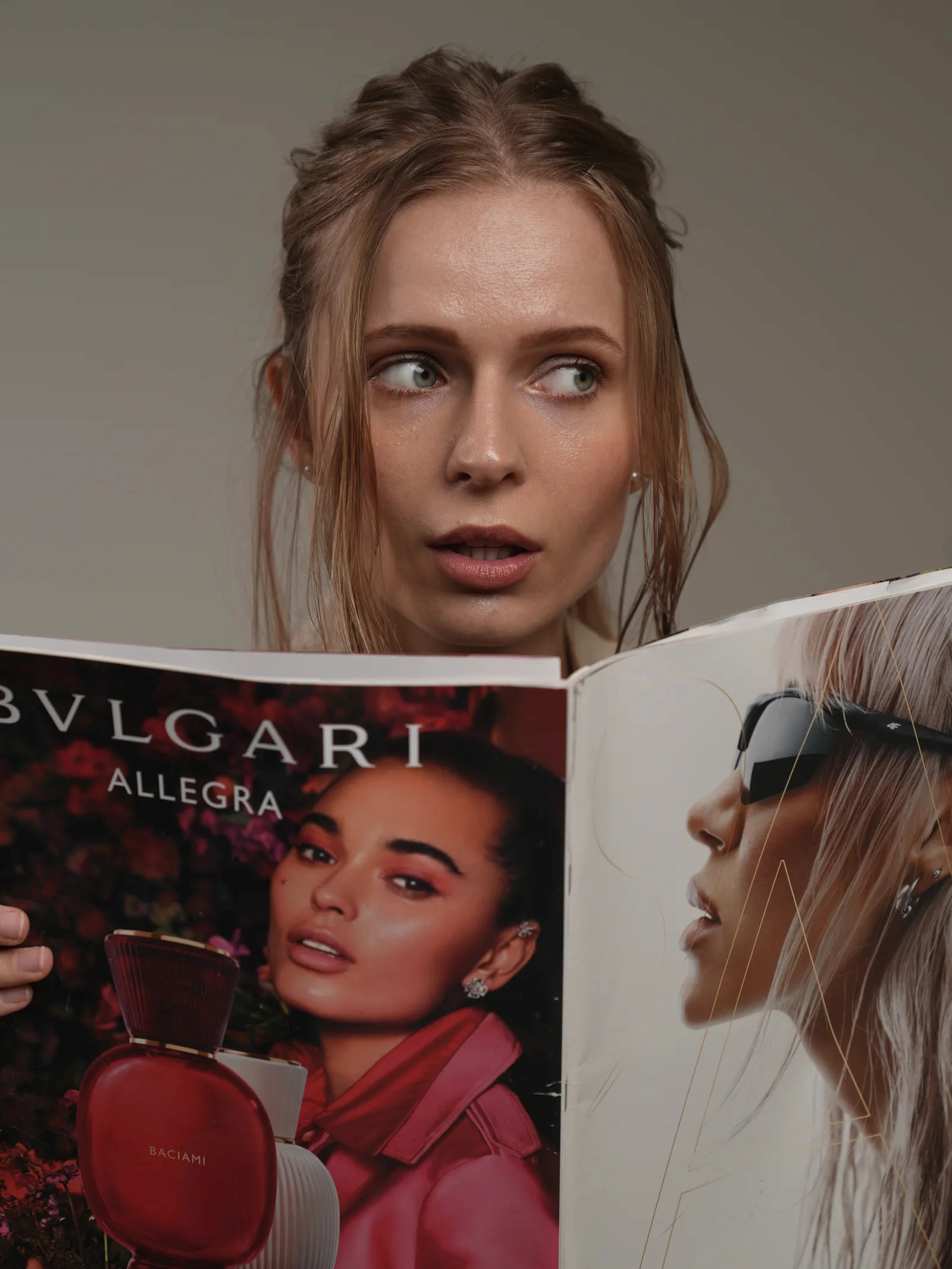 Model reading a fashion magazine in studio editorial by Studio Letouch